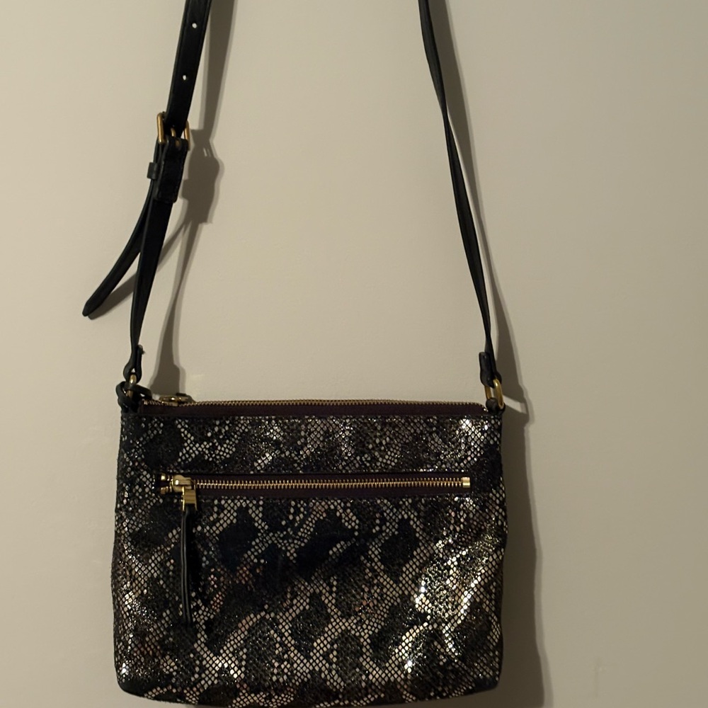 Fossil metallic black and gold crossbody bag